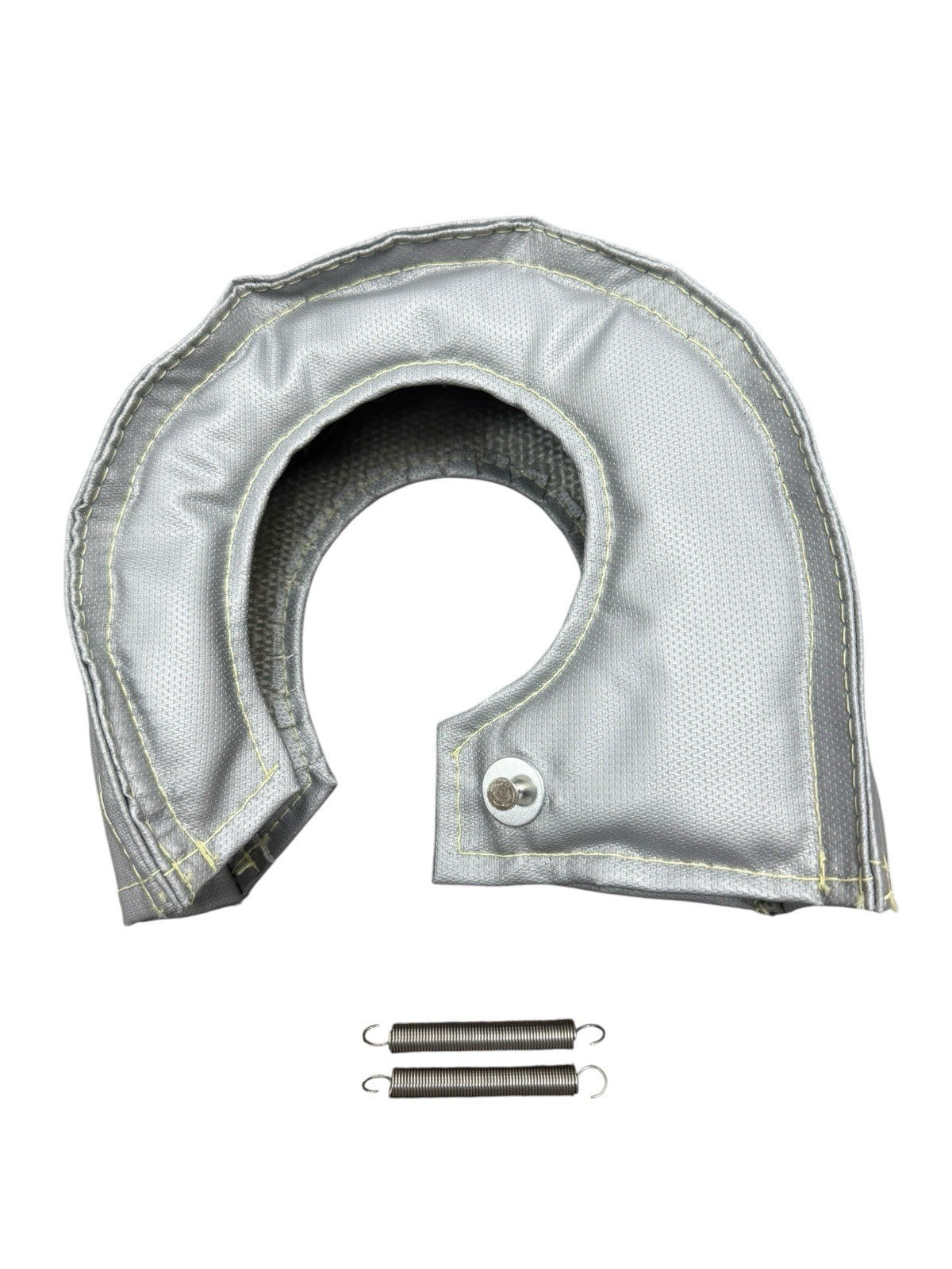 JackSpania Racing T3 T4 silver fiberglass turbo blanket heat shield on turbocharger, showing reflective silver material and secure wrap design.