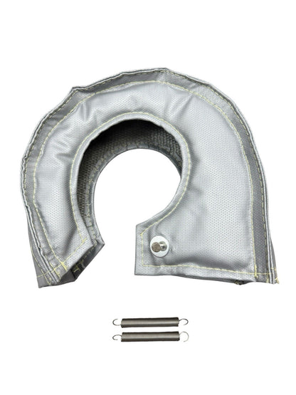 JackSpania Racing T3 T4 silver fiberglass turbo blanket heat shield on turbocharger, showing reflective silver material and secure wrap design.