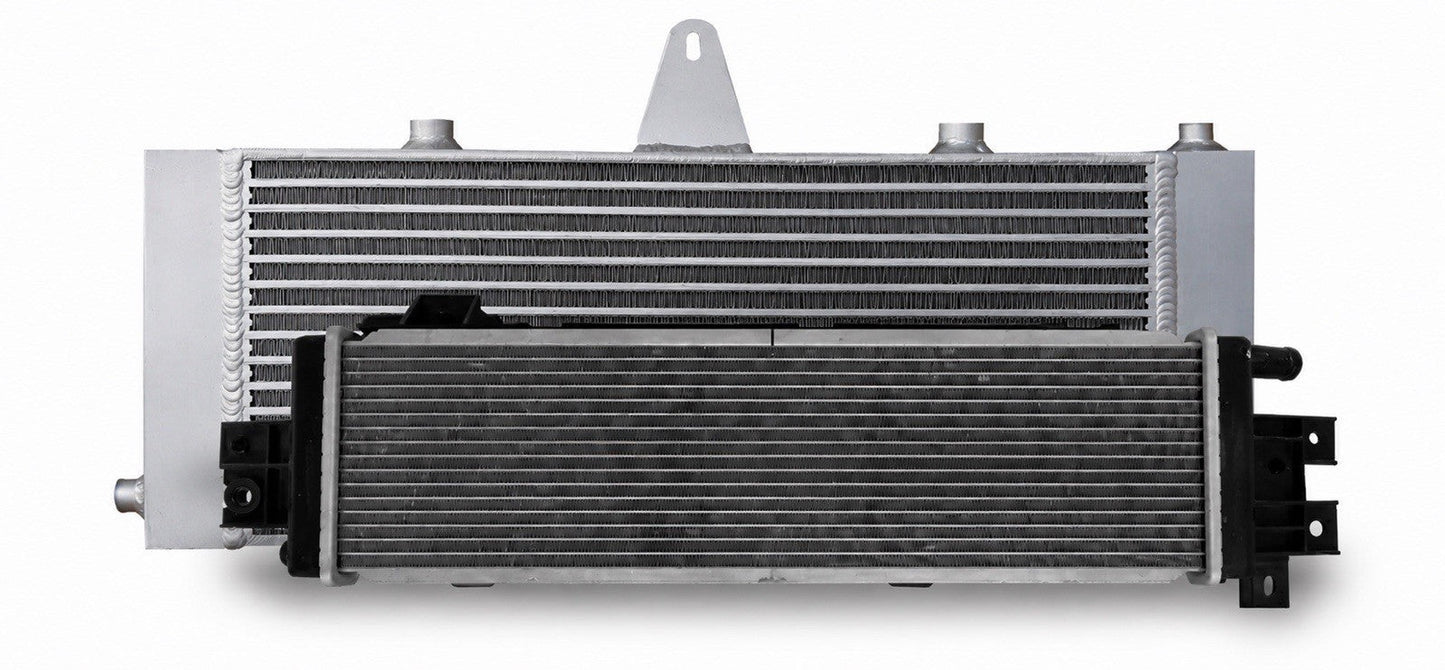JackSpania Racing VR30 heat exchanger upgrade installed in a 2016+ Infiniti Q50 or Q60 3.0T Red Sport engine, showing the new engine part.