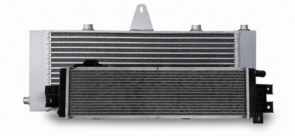 JackSpania Racing VR30 heat exchanger upgrade installed in a 2016+ Infiniti Q50 or Q60 3.0T Red Sport engine, showing the new engine part.