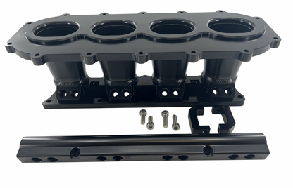 Jack Spania Racing billet K Series intake manifold adapter for Skunk2 Ultra engine parts, shown in a close-up image.