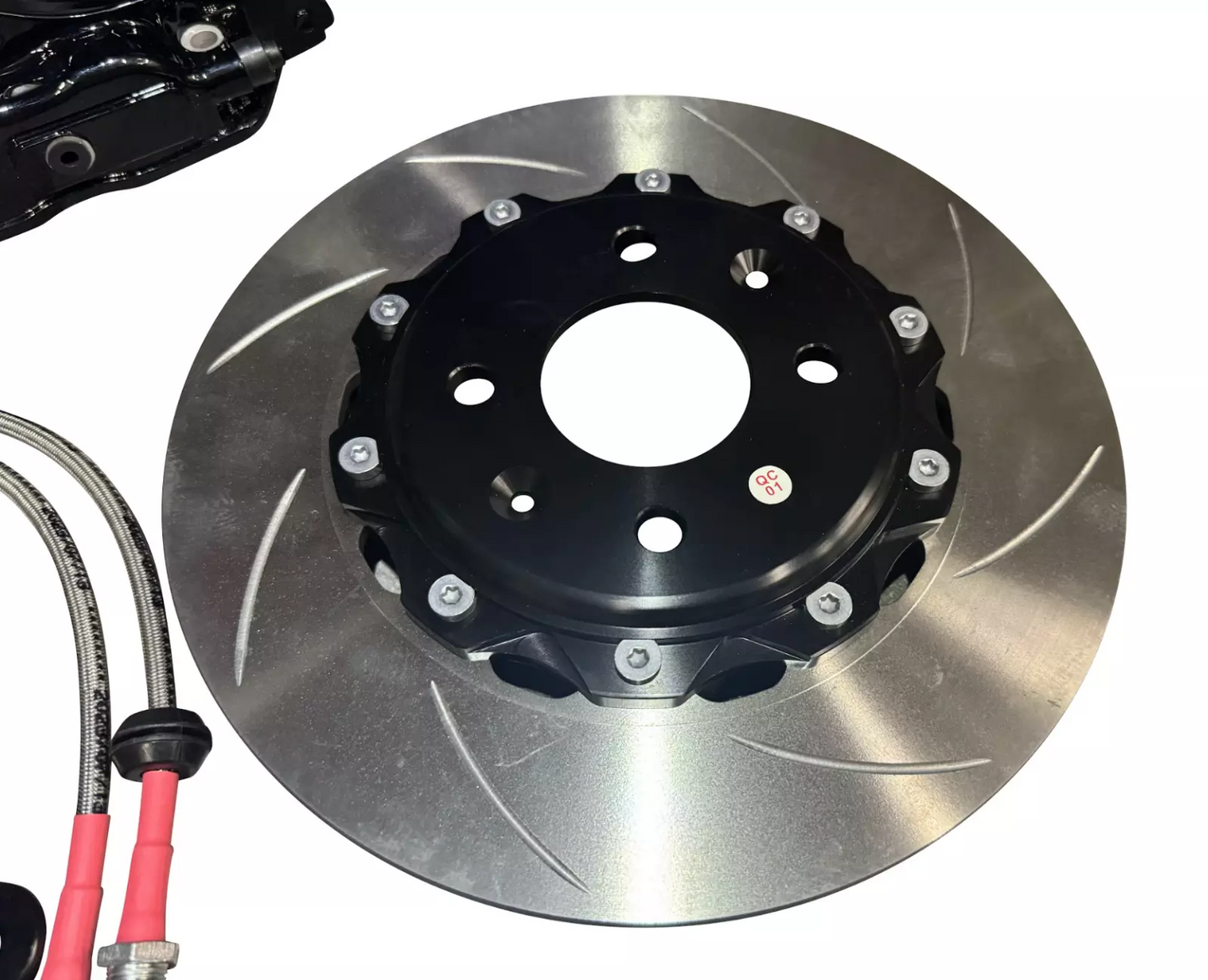JackSpania Racing JSR Track Brake Kit with 9.5-inch drilled slotted rotor and caliper for 88-00 Honda Civic front drivetrain.
