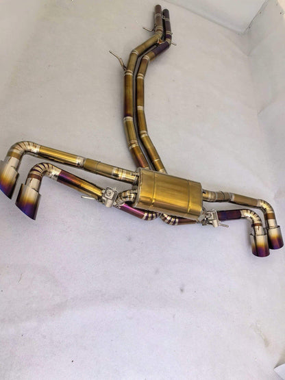 JackSpania Racing 3-inch titanium sport catback exhaust for Lamborghini Urus 2018-2024, showing the polished exhaust pipes and valves.
