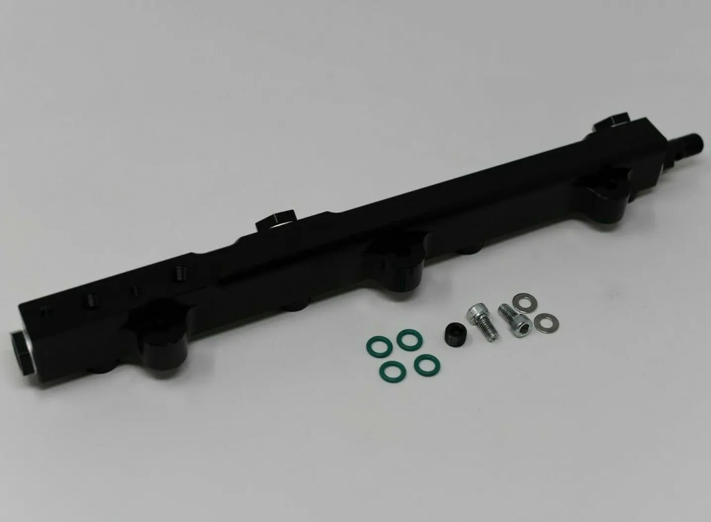 Jack Spania Racing high flow fuel rail for Honda Prelude H22 H23 and Accord F22 engine, showing the metal fuel rail with fittings.