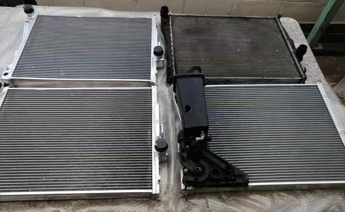 High performance JackSpania Racing heat exchanger radiator for BMW E46 3 Series, Z4, M52 M54 S54 engine parts, front view.