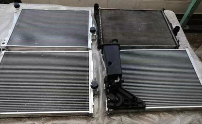 High performance JackSpania Racing heat exchanger radiator for BMW E46 3 Series, Z4, M52 M54 S54 engine parts, front view.