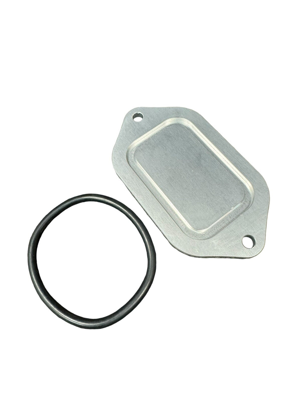 Billet aluminum block off plate for firewall engine harness on Honda Civic EK, by JackSpania Racing, displayed on a clean engine bay surface.