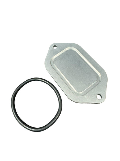 Billet aluminum block off plate for firewall engine harness on Honda Civic EK, by JackSpania Racing, displayed on a clean engine bay surface.