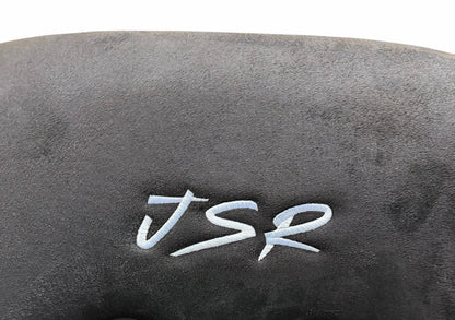 JackSpania Racing universal ultra-lightweight fixed bucket seat with suede upholstery, mounted with rails and sliders for interior racing setup.
