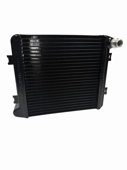 Auxiliary cooling radiator for Mercedes AMG GT S, C63, GLE63, GLS63 by JackSpania Racing, showing the metal core and fittings.