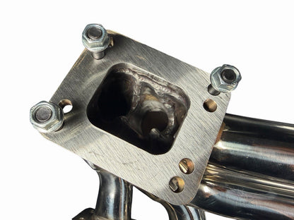 BMW E46 E36 E39 tubular turbo manifold with T3 T4 flange and 44mm wastegate, by JackSpania Racing, for exhaust performance.