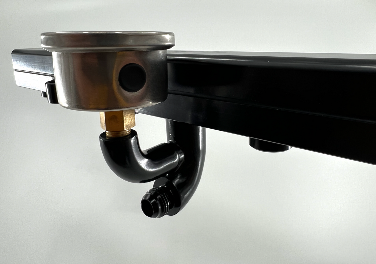 JackSpania Racing center mount fuel rail gauge holder with AN6 fitting for K Tuned K Series fuel rail engine part.