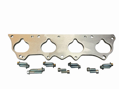 JackSpania Racing K24 intake manifold adapter kit for S2000 F20C F22C engines, showing metal adapter plates and mounting hardware.