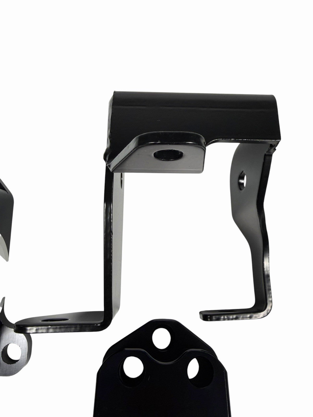 CNC solid engine mount for Honda EK Civic B16, B18, B20 engines, from JackSpania Racing, showing the metal construction and mounting features.