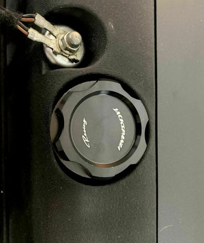 Jack Spania Racing BDFHJK Series valve cover oil cap for engine parts, with a black finish and detailed design.