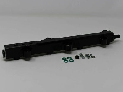 Jack Spania Racing high flow fuel rail for Honda Prelude H22 H23 and Accord F22 engine, metallic and detailed in design.