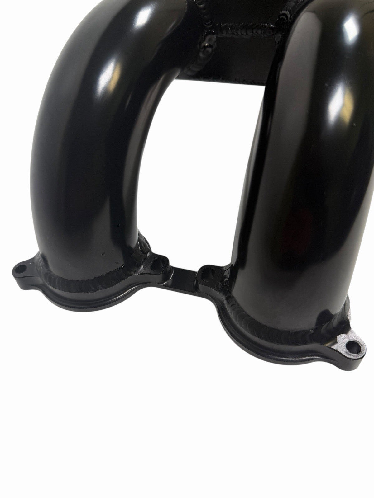 Rear-facing billet intake manifold for Subaru WRX STi 2004-2021 with 64mm throttle body, made by JackSpania Racing.