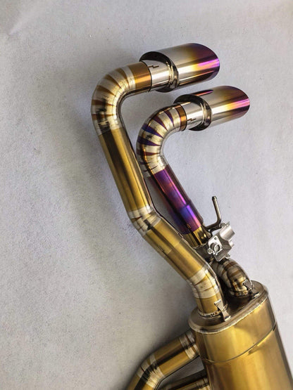 Titanium valved sport catback exhaust for 2018-2024 Lamborghini Urus by JackSpania Racing showing polished exhaust pipes and valves