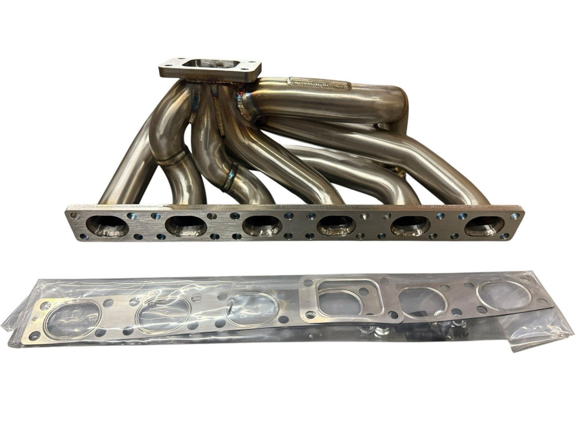 BMW E30 E34 M50 M52 M54 S50 tubular top mount turbo manifold with T3 44mm wastegate by JackSpania Racing, showing polished exhaust parts.