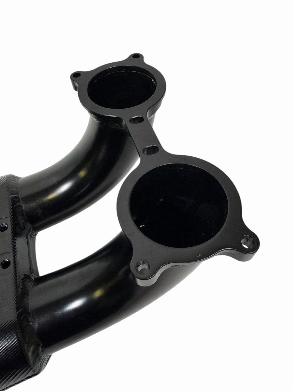 Rear facing billet intake manifold for Subaru WRX STi 04-21 with 64mm throttle body by JackSpania Racing, showing polished metal finish.