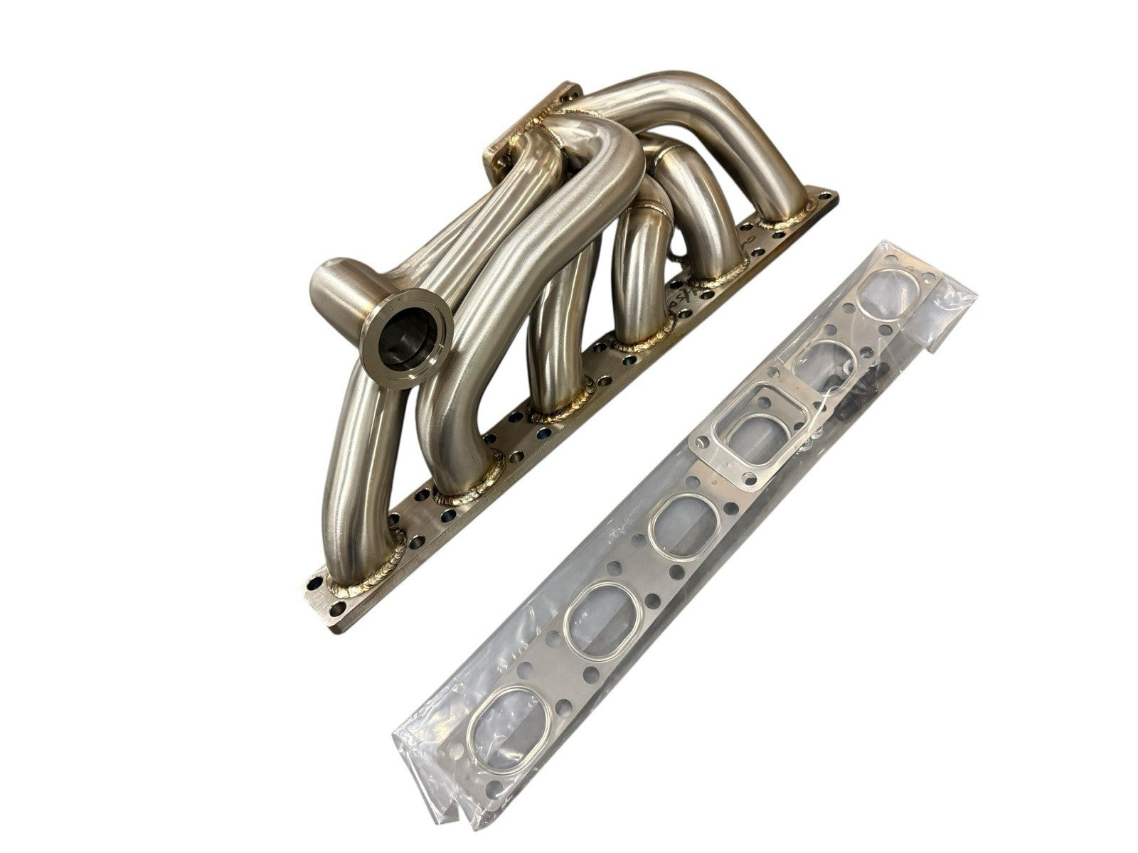 BMW E30 E34 M50 M52 M54 S50 tubular top mount turbo manifold with T3 44mm wastegate, made of exhaust parts by JackSpania Racing.