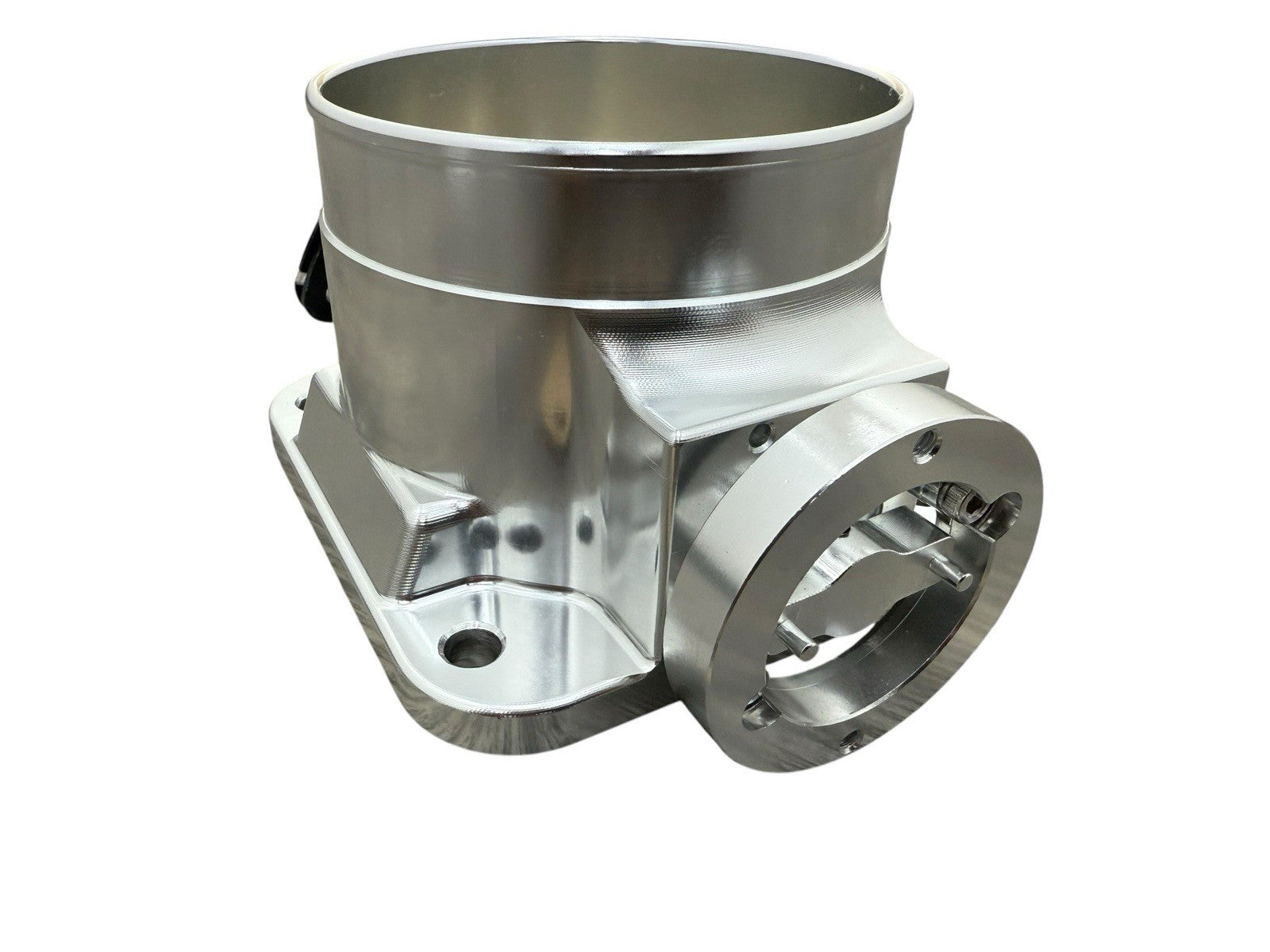 90mm throttle body adapter with 4-inch hose coupling for 2JZ and 1JZ engines, by JackSpania Racing, showing inlet connection.
