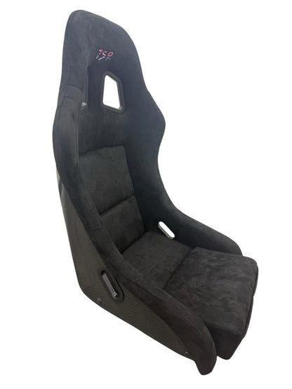 JackSpania Racing universal ultra-lightweight fixed bucket seat with suede upholstery, mounted with rails and sliders for interior racing setup.