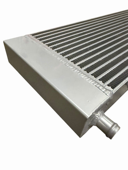 Infiniti Q50 Q60 3.0T VR30 heat exchanger upgrade by JackSpania Racing, showcasing engine parts in a close-up view.