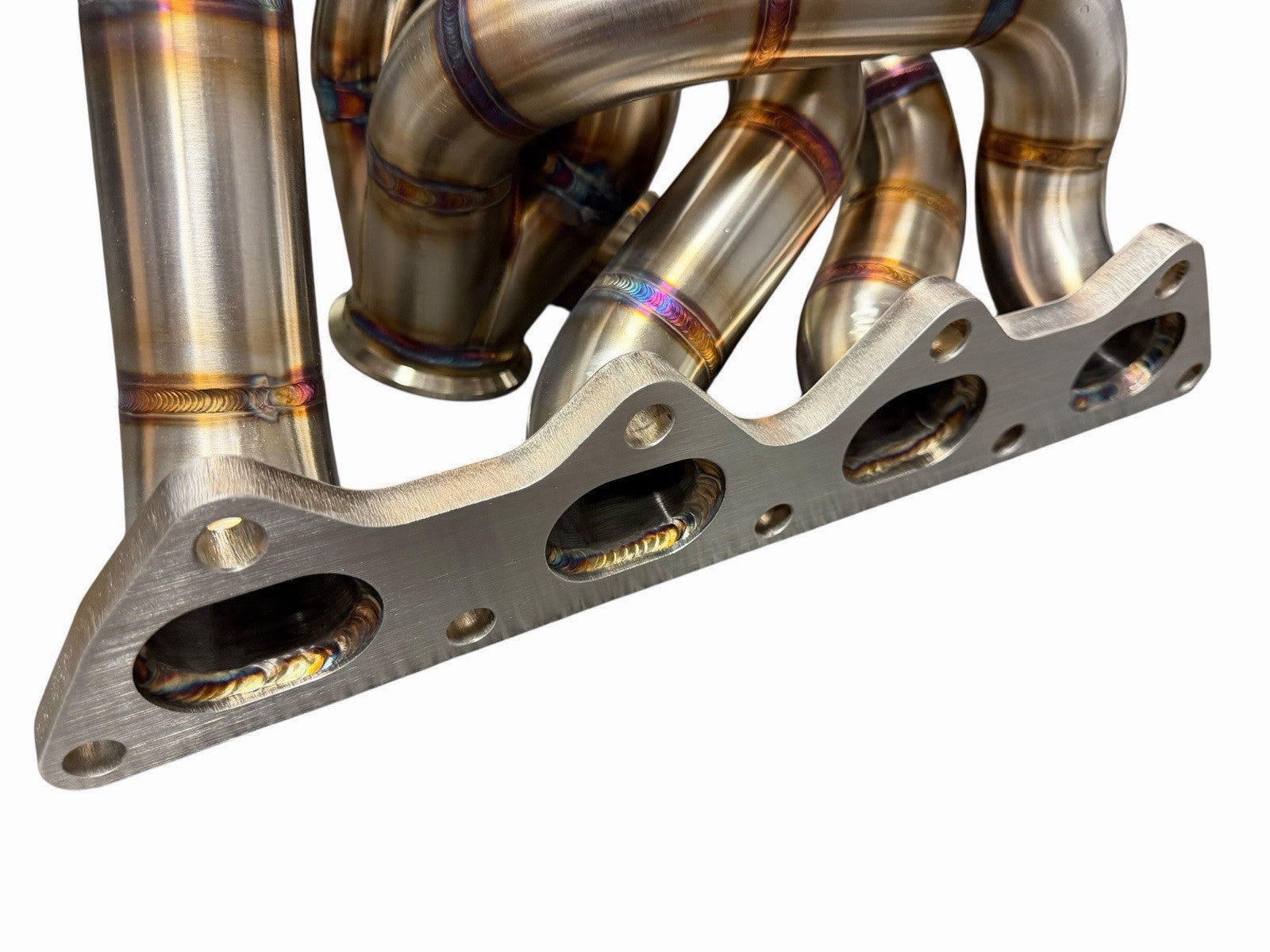 JackSpania Racing 316SS tubular turbo manifold for Evo 7-9 with 44mm wastegate and V-band, compatible with Garrett G25 G30 turbos.