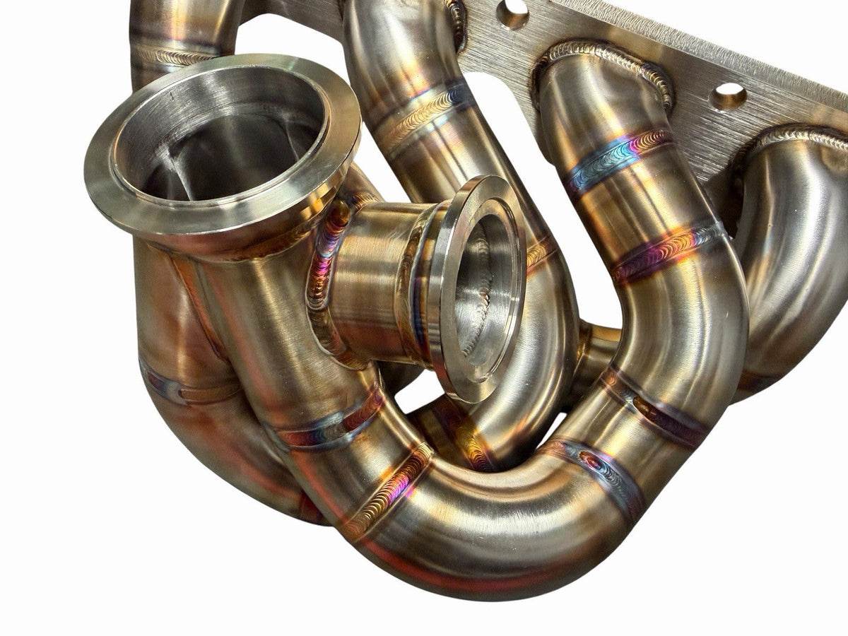 JackSpania Racing 316SS tubular turbo manifold for Evo 7-9 with 44mm V-band wastegate and G25 G30 turbocharger.