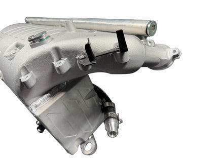 Cast aluminum charge cooler intake manifold for BMW G87 M2, G80 M3, G82 M4 S58 engine by JackSpania Racing, showcasing the polished finish