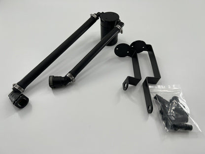 Jack Spania Racing oil separator catch can installed in a Dodge Durango Hellcat Trackhawk engine, showing the engine bay and catch can.