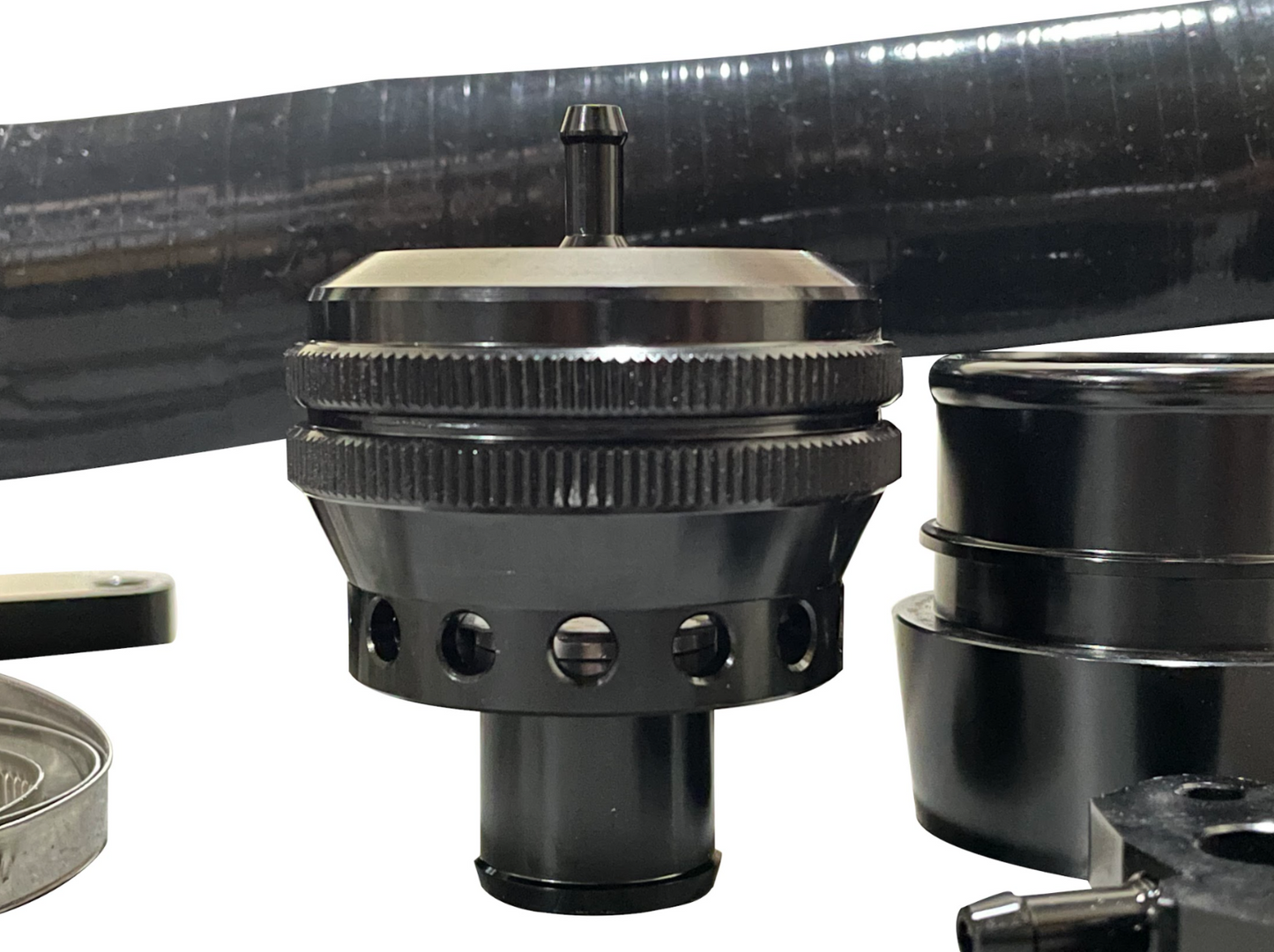 Jack Spania Racing dump blow off valve BOV kit for VW Audi 1.2 & 1.4 TSI engine parts, showcasing the valve components and fittings.