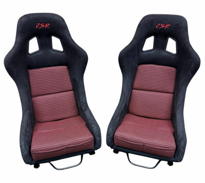 JackSpania Racing ultra lightweight fixed bucket seat with suede upholstery, mounted on rails with sliders for interior racing vehicle.