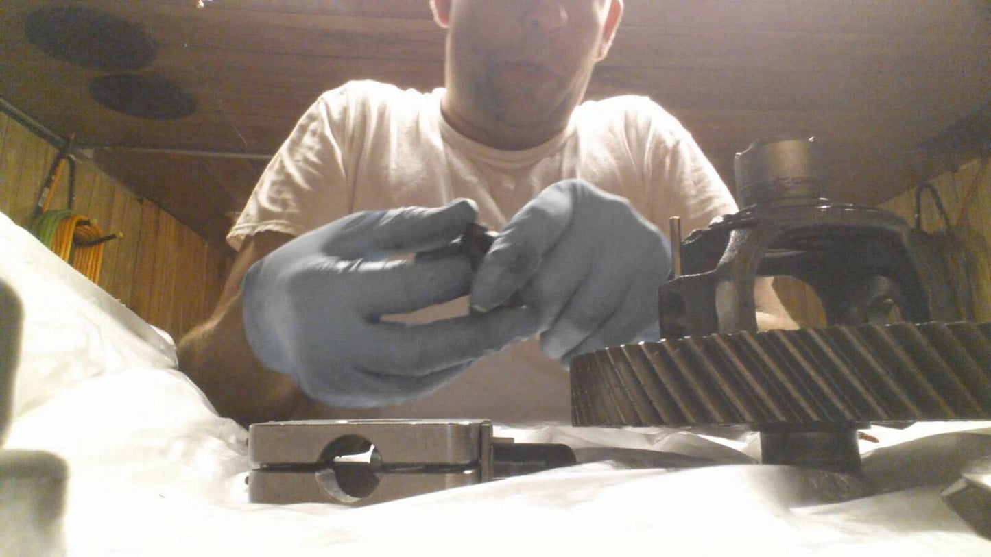 Jack Spania Racing LSD Limited Slip Differential Conversion Grip Kit for transmission parts, showing the metal components and installation details.