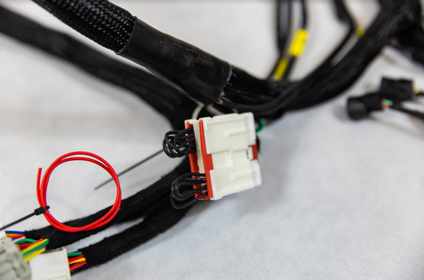Jack Spania Racing K20 K24 K-Series tucked engine harness for Honda Acura K-Swap, compatible with RSX, Civic Si, and EP3 engines.