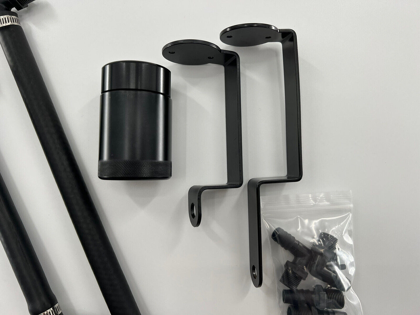 Jack Spania Racing oil separator catch can for 6.2 Supercharged Dodge Durango Hellcat and Trackhawk engine parts, mounted on engine.