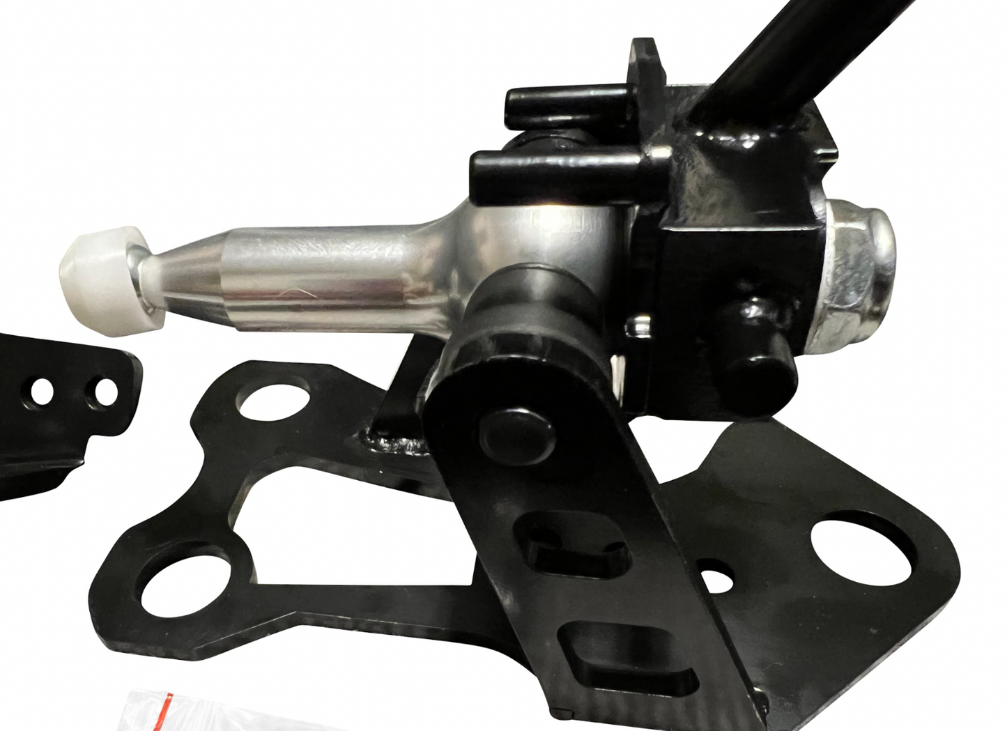 OEM K20z3 shift cable bracket for 8th gen Honda Civic transmission, by Jack Spania Racing, shown on a vehicle part.