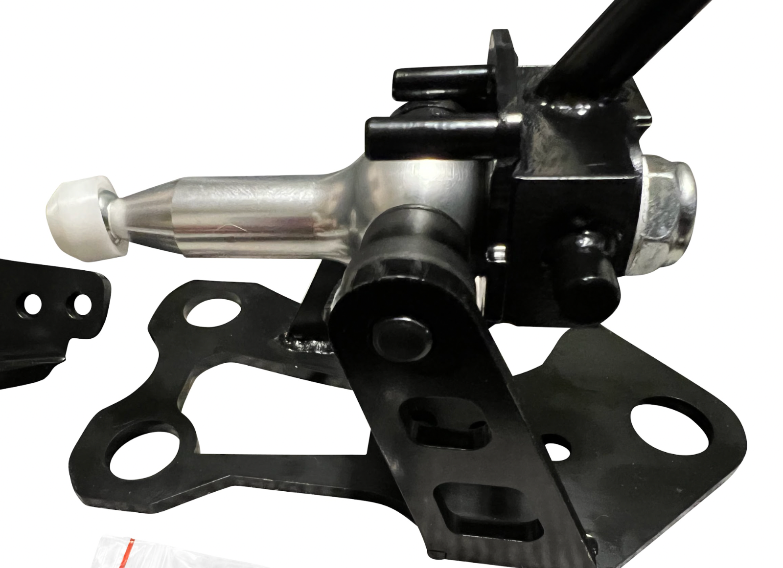 OEM K20z3 shift cable bracket for 8th gen Honda Civic transmission, by Jack Spania Racing, shown on a vehicle part.