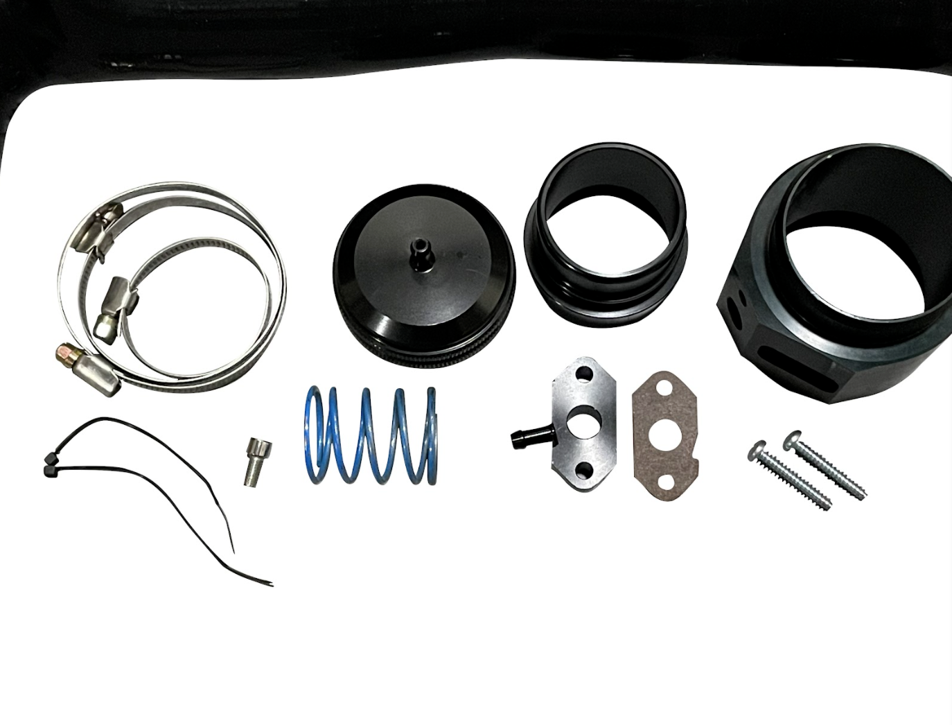 Jack Spania Racing dump blow off valve BOV kit for VW and Audi 1.2 & 1.4 TSI engine parts, with visible valve and fittings.