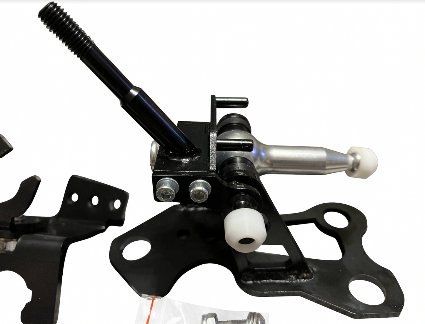 OEM K20z3 shift cable bracket for 8th Gen Honda Civic transmission, by Jack Spania Racing, shown in a close-up image.