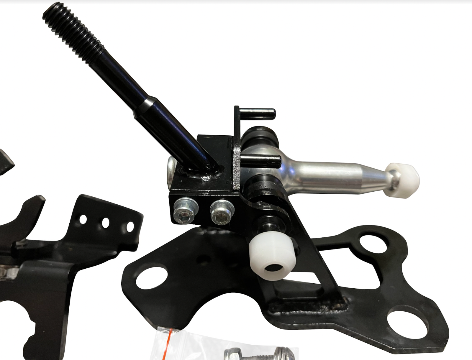 OEM K20z3 shift cable bracket for 8th Gen Honda Civic transmission, by Jack Spania Racing, shown in a close-up image.