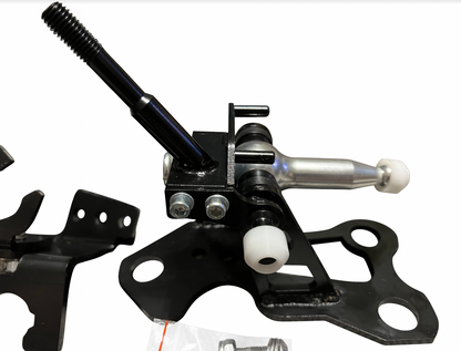 OEM K20z3 shift cable bracket for 8th Gen Honda Civic transmission, by Jack Spania Racing, shown in a close-up image.