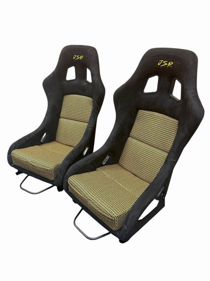 JackSpania Racing universal ultra lightweight fixed bucket seat with rails and sliders in suede, showing the interior design and mounting hardware.