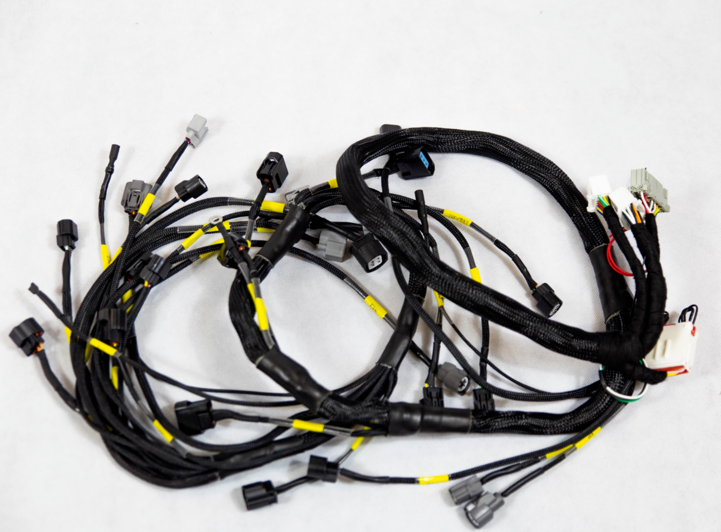 Jack Spania Racing K20 K24 K-Series engine harness for Honda Acura K-Swap, showing the wiring connectors and cable layout.
