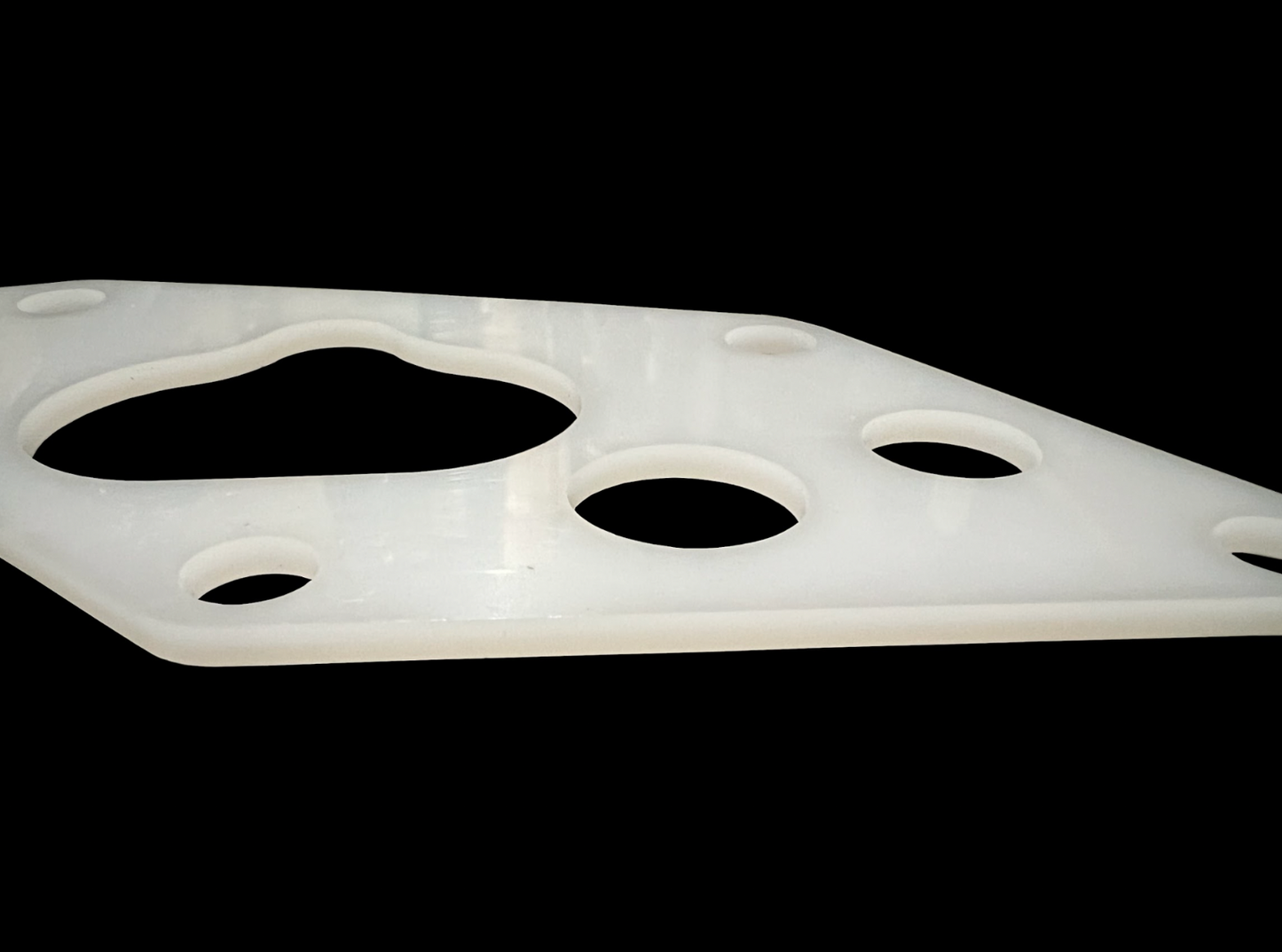 Jack Spania Racing B Series Thermal Intake Manifold Gasket for Acura Integra B18A B18B B20 engine, close-up view of gasket.