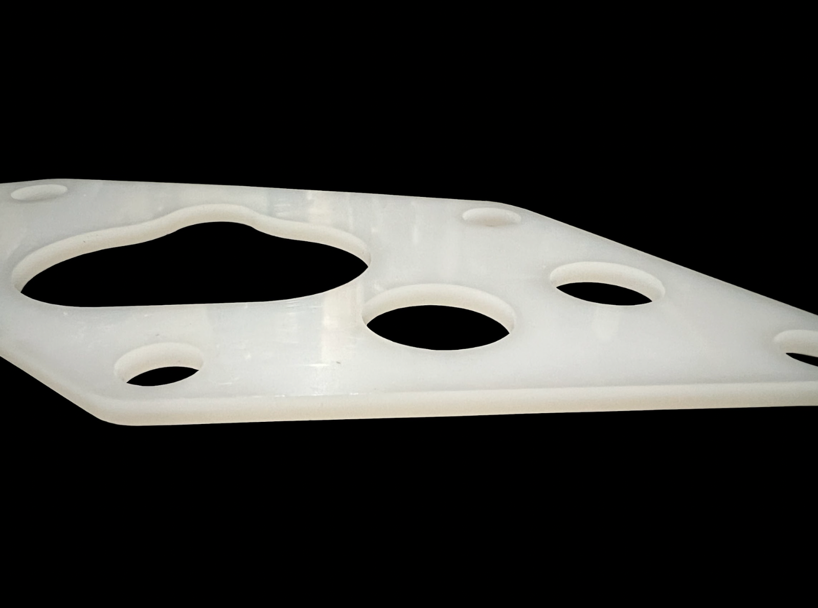Jack Spania Racing B Series Thermal Intake Manifold Gasket for Acura Integra B18A B18B B20 engine, close-up view of gasket.