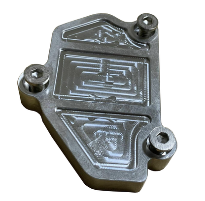Jack Spania Racing Vtec solenoid block off plate for Honda Acura B-Series B16 B18 engine parts, shown on engine in close-up image.