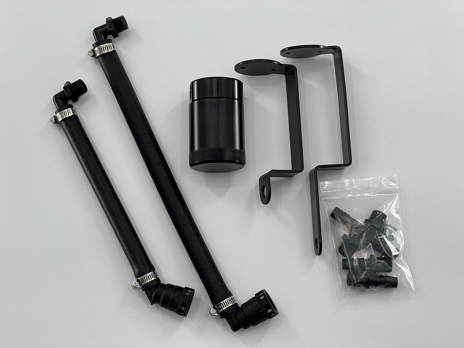 Jack Spania Racing oil separator catch can for Dodge Durango Hellcat Trackhawk 6.2 supercharged engine parts, shown installed on engine.
