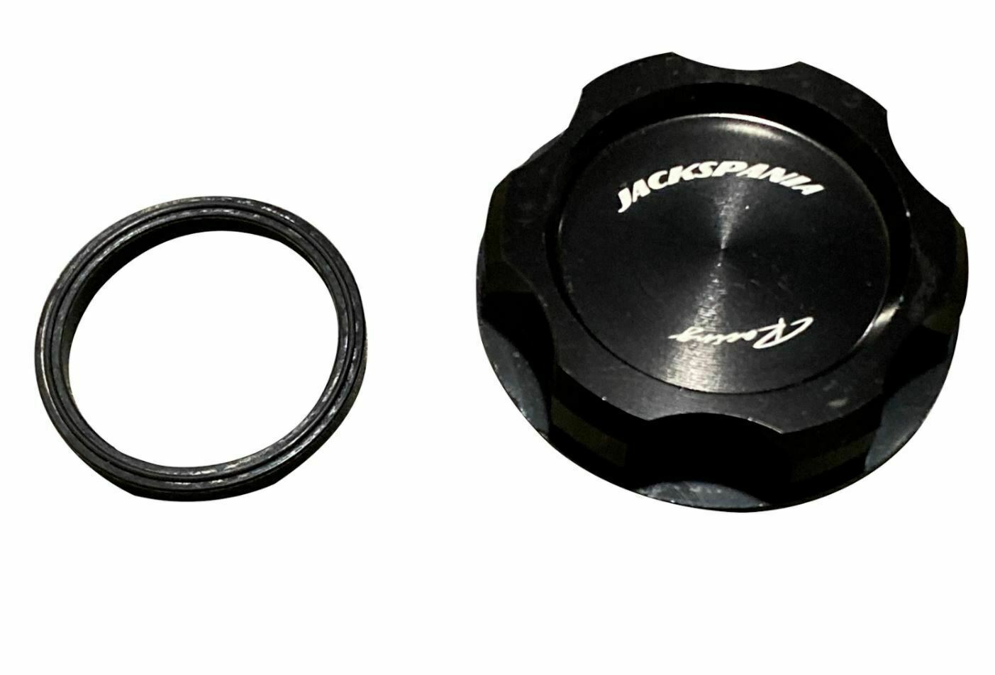 Jack Spania Racing B D F H J K Series valve cover oil cap for engine parts, showing the black metal design and branding.